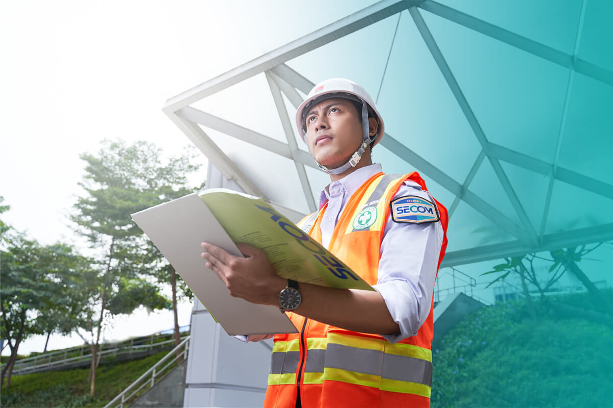 SECOM Technician Controlling Installation